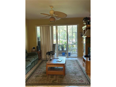 Beautifully Furnished End Unit with Lake Views! Discover the on Cypress Woods Golf and Country Club in Florida - for sale on GolfHomes.com, golf home, golf lot