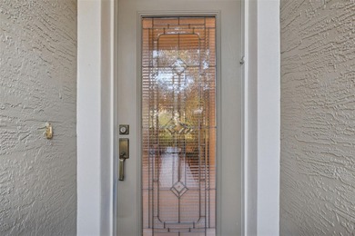 Step into a lifestyle of ease and elegance in this meticulously on Largo Golf Course in Florida - for sale on GolfHomes.com, golf home, golf lot