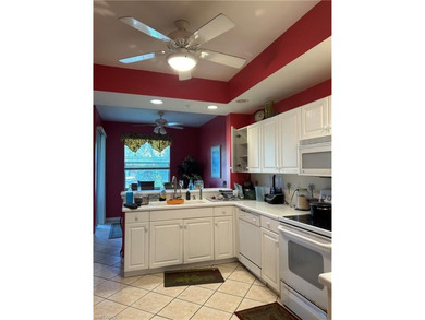 Beautifully Furnished End Unit with Lake Views! Discover the on Cypress Woods Golf and Country Club in Florida - for sale on GolfHomes.com, golf home, golf lot