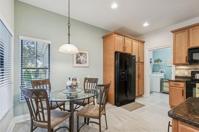 Step into a lifestyle of ease and elegance in this meticulously on Largo Golf Course in Florida - for sale on GolfHomes.com, golf home, golf lot