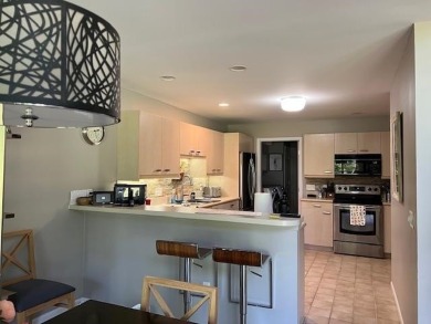 Highly sought-after Fairways condo featuring three bedrooms plus on Birchwood Farms Golf and Country Club in Michigan - for sale on GolfHomes.com, golf home, golf lot