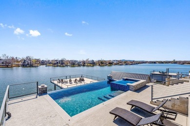 Premier Lake LBJ waterfront living inside the gated Legends on Legends Golf Course in Texas - for sale on GolfHomes.com, golf home, golf lot