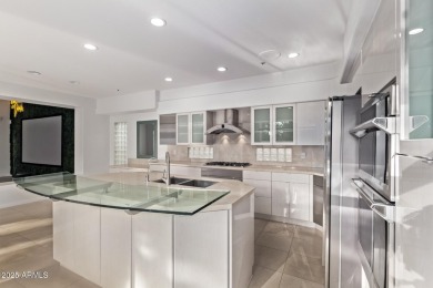 Tucked into a quiet cul-de-sac in the exclusive gated community on Gainey Ranch Golf Club in Arizona - for sale on GolfHomes.com, golf home, golf lot