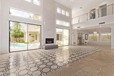 Tucked into a quiet cul-de-sac in the exclusive gated community on Gainey Ranch Golf Club in Arizona - for sale on GolfHomes.com, golf home, golf lot