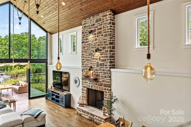 Waterfront custom home w/ one-of-a-kind architecture is a must on Westport Golf Club in North Carolina - for sale on GolfHomes.com, golf home, golf lot