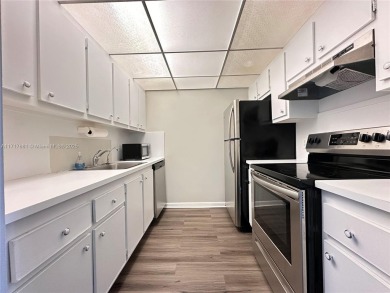 Buy this 1st floor condo 1 bedroom 1.5 baths 1 parking space on Flamingo Lakes Country Club in Florida - for sale on GolfHomes.com, golf home, golf lot
