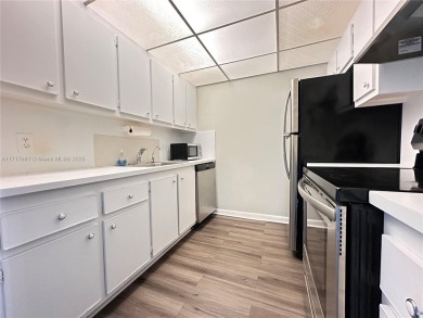 Buy this 1st floor condo 1 bedroom 1.5 baths 1 parking space on Flamingo Lakes Country Club in Florida - for sale on GolfHomes.com, golf home, golf lot