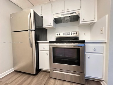 Buy this 1st floor condo 1 bedroom 1.5 baths 1 parking space on Flamingo Lakes Country Club in Florida - for sale on GolfHomes.com, golf home, golf lot
