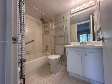 Buy this 1st floor condo 1 bedroom 1.5 baths 1 parking space on Flamingo Lakes Country Club in Florida - for sale on GolfHomes.com, golf home, golf lot