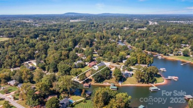 Waterfront custom home w/ one-of-a-kind architecture is a must on Westport Golf Club in North Carolina - for sale on GolfHomes.com, golf home, golf lot