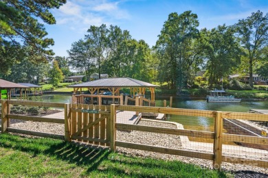 Waterfront custom home w/ one-of-a-kind architecture is a must on Westport Golf Club in North Carolina - for sale on GolfHomes.com, golf home, golf lot