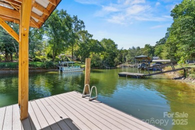 Waterfront custom home w/ one-of-a-kind architecture is a must on Westport Golf Club in North Carolina - for sale on GolfHomes.com, golf home, golf lot