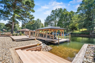 Waterfront custom home w/ one-of-a-kind architecture is a must on Westport Golf Club in North Carolina - for sale on GolfHomes.com, golf home, golf lot