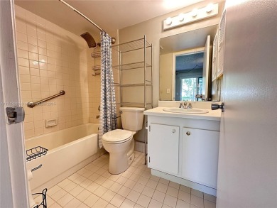 Buy this 1st floor condo 1 bedroom 1.5 baths 1 parking space on Flamingo Lakes Country Club in Florida - for sale on GolfHomes.com, golf home, golf lot