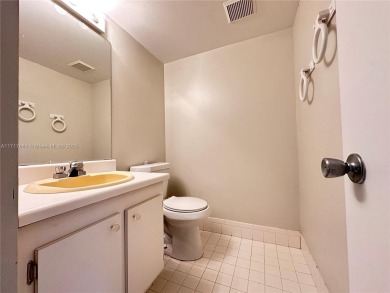 Buy this 1st floor condo 1 bedroom 1.5 baths 1 parking space on Flamingo Lakes Country Club in Florida - for sale on GolfHomes.com, golf home, golf lot