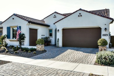 This stunning home has everything! Resort-style pool & spa plus on Verrado Golf Club - Victory in Arizona - for sale on GolfHomes.com, golf home, golf lot