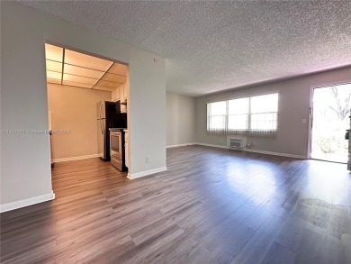 Buy this 1st floor condo 1 bedroom 1.5 baths 1 parking space on Flamingo Lakes Country Club in Florida - for sale on GolfHomes.com, golf home, golf lot
