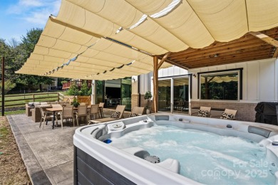 Waterfront custom home w/ one-of-a-kind architecture is a must on Westport Golf Club in North Carolina - for sale on GolfHomes.com, golf home, golf lot