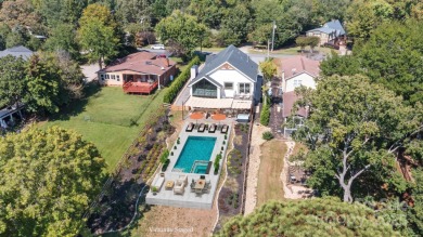 Waterfront custom home w/ one-of-a-kind architecture is a must on Westport Golf Club in North Carolina - for sale on GolfHomes.com, golf home, golf lot
