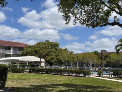 Buy this 1st floor condo 1 bedroom 1.5 baths 1 parking space on Flamingo Lakes Country Club in Florida - for sale on GolfHomes.com, golf home, golf lot