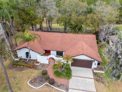 Welcome to your dream home  -  move-in ready and waiting for you on Tarpon Woods Golf Club in Florida - for sale on GolfHomes.com, golf home, golf lot