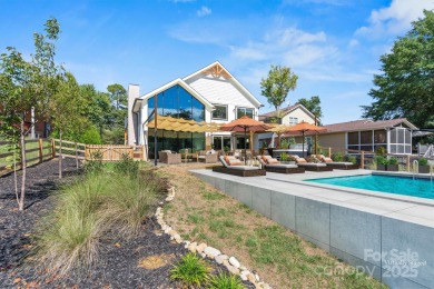 Waterfront custom home w/ one-of-a-kind architecture is a must on Westport Golf Club in North Carolina - for sale on GolfHomes.com, golf home, golf lot
