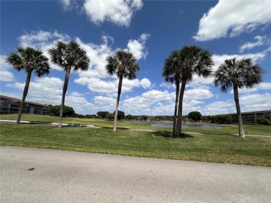 Buy this 1st floor condo 1 bedroom 1.5 baths 1 parking space on Flamingo Lakes Country Club in Florida - for sale on GolfHomes.com, golf home, golf lot
