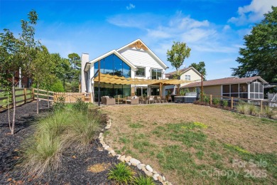 Waterfront custom home w/ one-of-a-kind architecture is a must on Westport Golf Club in North Carolina - for sale on GolfHomes.com, golf home, golf lot