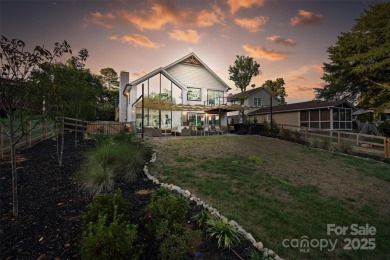 Waterfront custom home w/ one-of-a-kind architecture is a must on Westport Golf Club in North Carolina - for sale on GolfHomes.com, golf home, golf lot