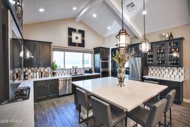 This stunning home has everything! Resort-style pool & spa plus on Verrado Golf Club - Victory in Arizona - for sale on GolfHomes.com, golf home, golf lot