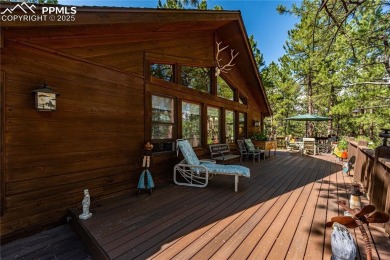 Nestled among towering pines in the prestigious Perry Park golf on Perry Park Country Club in Colorado - for sale on GolfHomes.com, golf home, golf lot