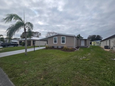 No other home compares to this extensively upgraded gem. With on Spanish Lakes Country Club in Florida - for sale on GolfHomes.com, golf home, golf lot