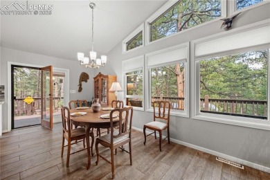 Nestled among towering pines in the prestigious Perry Park golf on Perry Park Country Club in Colorado - for sale on GolfHomes.com, golf home, golf lot