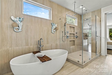 Waterfront custom home w/ one-of-a-kind architecture is a must on Westport Golf Club in North Carolina - for sale on GolfHomes.com, golf home, golf lot