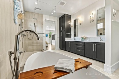 Waterfront custom home w/ one-of-a-kind architecture is a must on Westport Golf Club in North Carolina - for sale on GolfHomes.com, golf home, golf lot