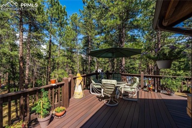 Nestled among towering pines in the prestigious Perry Park golf on Perry Park Country Club in Colorado - for sale on GolfHomes.com, golf home, golf lot