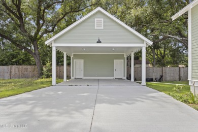 Located in the highly sought-after golf cart district of on Gulf Hills Golf Club in Mississippi - for sale on GolfHomes.com, golf home, golf lot