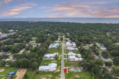 Located in the highly sought-after golf cart district of on Gulf Hills Golf Club in Mississippi - for sale on GolfHomes.com, golf home, golf lot