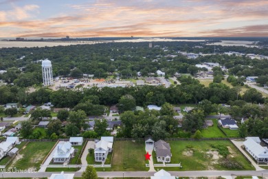 Located in the highly sought-after golf cart district of on Gulf Hills Golf Club in Mississippi - for sale on GolfHomes.com, golf home, golf lot