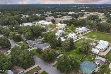 Located in the highly sought-after golf cart district of on Gulf Hills Golf Club in Mississippi - for sale on GolfHomes.com, golf home, golf lot