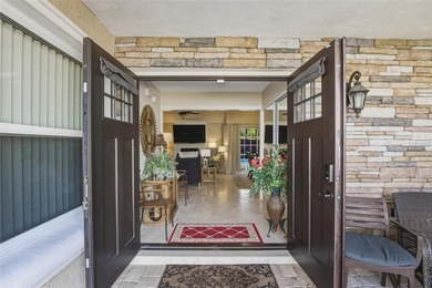 Welcome to this stunning 4-bedroom, 2-bath completely remodeled on Orange Tree Golf Club in Florida - for sale on GolfHomes.com, golf home, golf lot