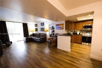 WHY RENT WHEN YOU CAN OWN THIS 2/2 CONDO WITH ALMOST 1,100 SQ on Woodlands Country Club in Florida - for sale on GolfHomes.com, golf home, golf lot