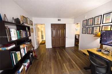 WHY RENT WHEN YOU CAN OWN THIS 2/2 CONDO WITH ALMOST 1,100 SQ on Woodlands Country Club in Florida - for sale on GolfHomes.com, golf home, golf lot