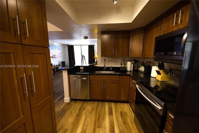 WHY RENT WHEN YOU CAN OWN THIS 2/2 CONDO WITH ALMOST 1,100 SQ on Woodlands Country Club in Florida - for sale on GolfHomes.com, golf home, golf lot