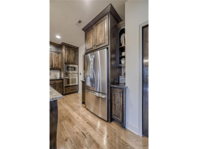 STUNNING is an understatement for this custom 1.5 story home on Staley Farms Golf Club in Missouri - for sale on GolfHomes.com, golf home, golf lot