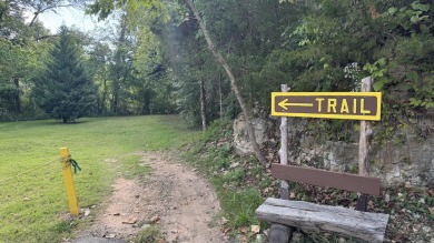 LAKEFRONT, LAKEFRONT, LAKEFRONT! This fully furnished, turnkey on Pointe Royale Village Country Club in Missouri - for sale on GolfHomes.com, golf home, golf lot