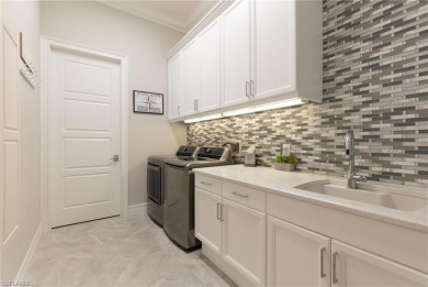 ONE OF A KIND HOME WITH GARAGE SPACE AND FULL HOOK UPS FOR UP TO on Eagle Lakes Golf Club in Florida - for sale on GolfHomes.com, golf home, golf lot