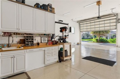ONE OF A KIND HOME WITH GARAGE SPACE AND FULL HOOK UPS FOR UP TO on Eagle Lakes Golf Club in Florida - for sale on GolfHomes.com, golf home, golf lot