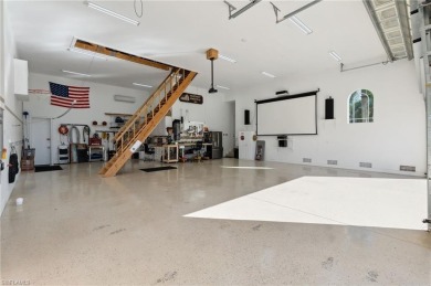ONE OF A KIND HOME WITH GARAGE SPACE AND FULL HOOK UPS FOR UP TO on Eagle Lakes Golf Club in Florida - for sale on GolfHomes.com, golf home, golf lot