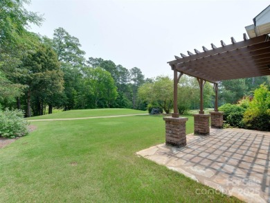 Yes, you can have it all! This recently renovated primary on the on Highland Creek Golf Club in North Carolina - for sale on GolfHomes.com, golf home, golf lot